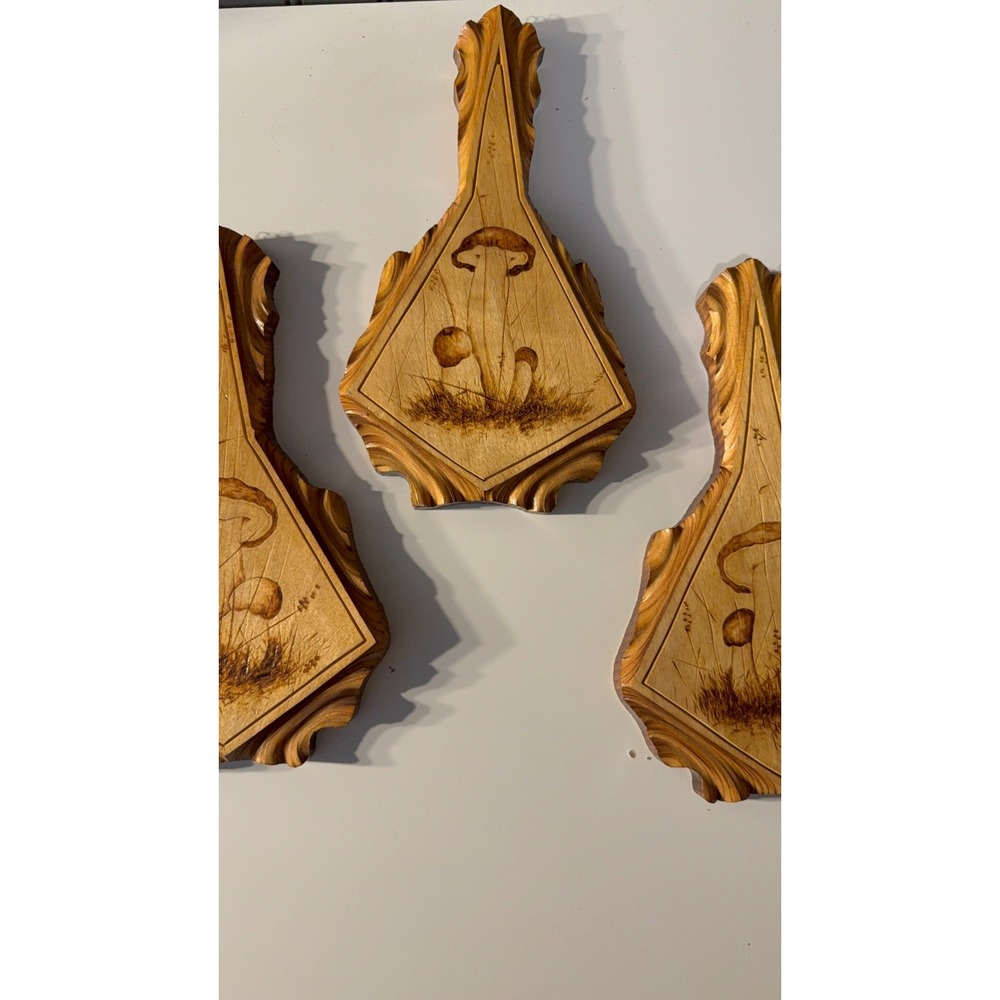 decorative wooden board with a hand-burned mushroom pyrography design vintage
